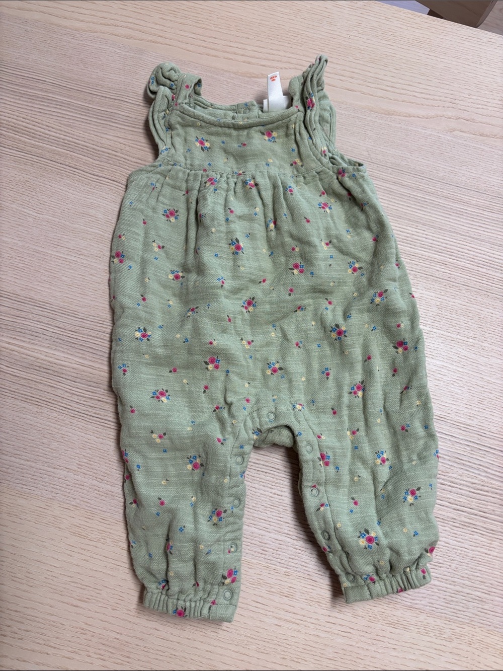 Green floral ruffle romper